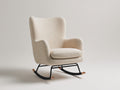 Fauteuil à bascule en tissu bouclé beige structure métal noir et patins bois 80x84x100 cm style scandinave salon intérieur